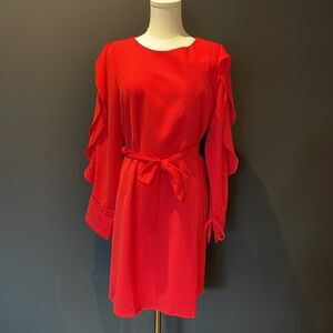 Long ruffled sleeve red belted dress